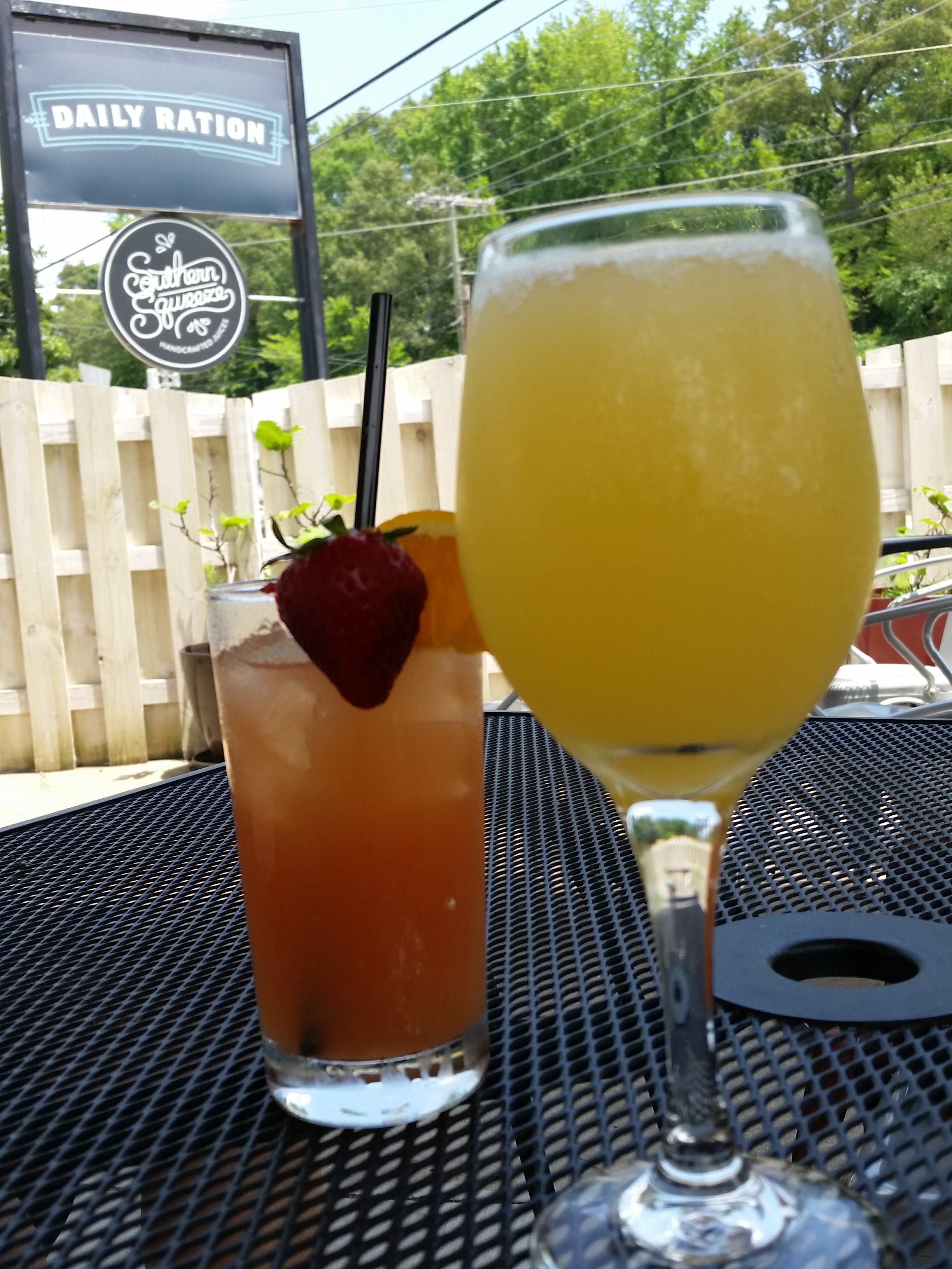 Brunch Punch ($6) — rum, pineapple and orange juices, berry simple and lime — and Le Mimosa ($4) from The Daily Ration.