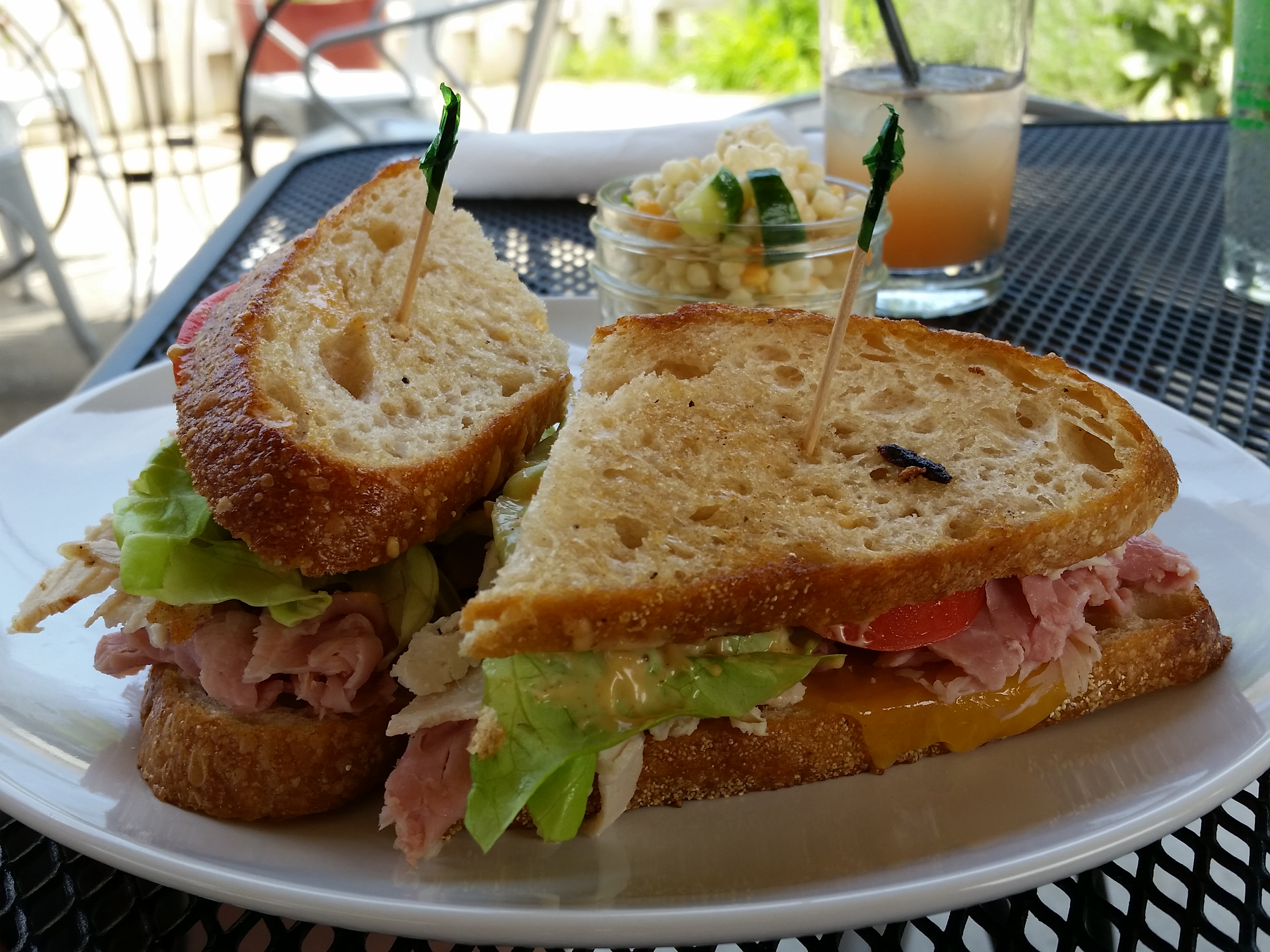 The Daily Ration's Club Ration features deep-fried turkey, Applewood-smoked ham, cheddar cheese, lettuce, tomato and Cajun aioli, served here on lightly toasted sourdough bread.