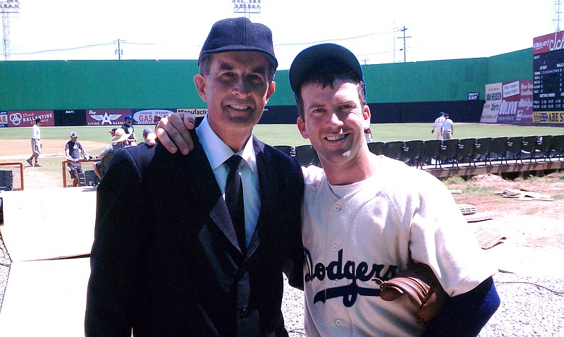 Gary Miller is shown on the set of "42" with actor Lucas Black at Engel Stadium. Miller auditioned to be an extra on a whim and has now been an extra in almost a dozen films and one television show.