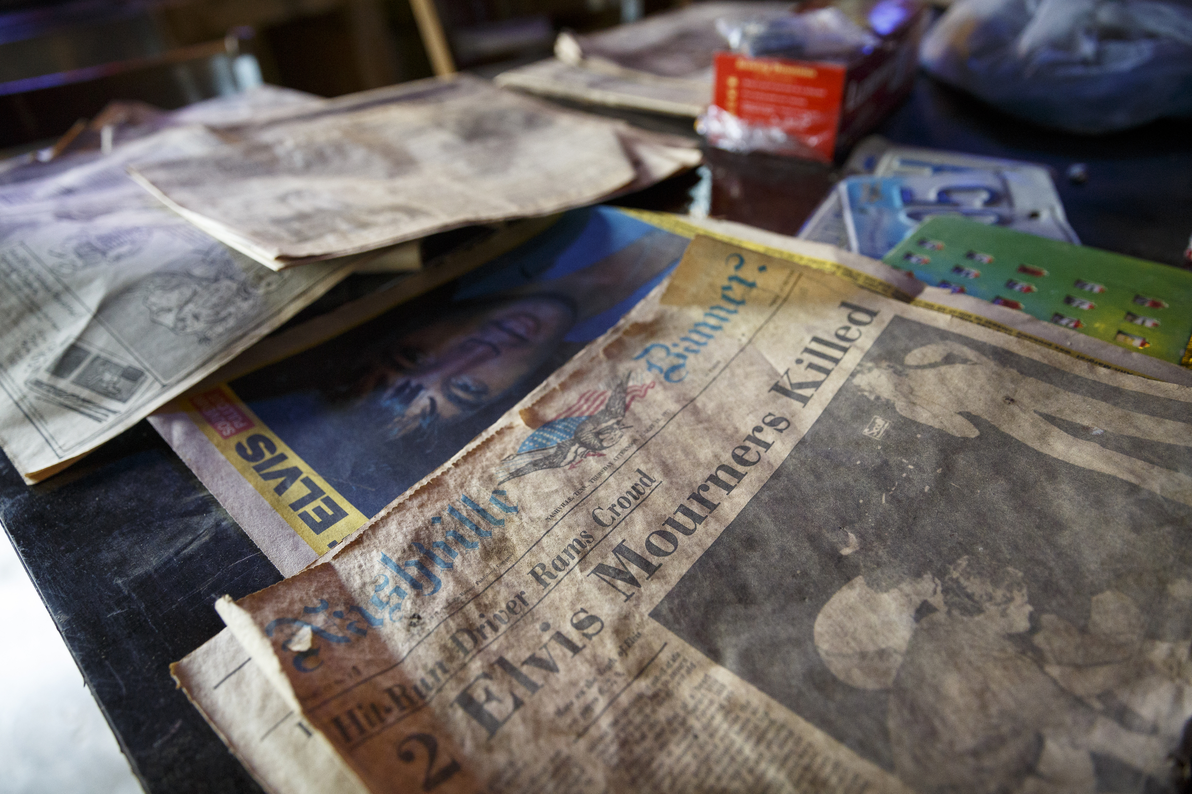 An old newspaper clipping is seen before being used for decoration at the new Lee Highway location of Champy's Fried Chicken which is under construction Tuesday, June 28, 2016, in Chattanooga, Tenn.