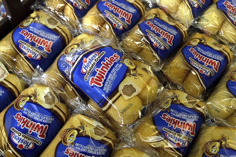 
              FILE - In this Nov. 16, 2013, file photo, Twinkies baked goods are displayed for sale at the Hostess Brands' bakery in Denver. Almost four years after seeking bankruptcy protection under a barrage of labor issues and rapidly changing appetites, the maker of Twinkies and Ding Dongs will take the stage once again as a publicly traded company Tuesday, July 5, 2016. (AP Photo/Brennan Linsley, File)
            