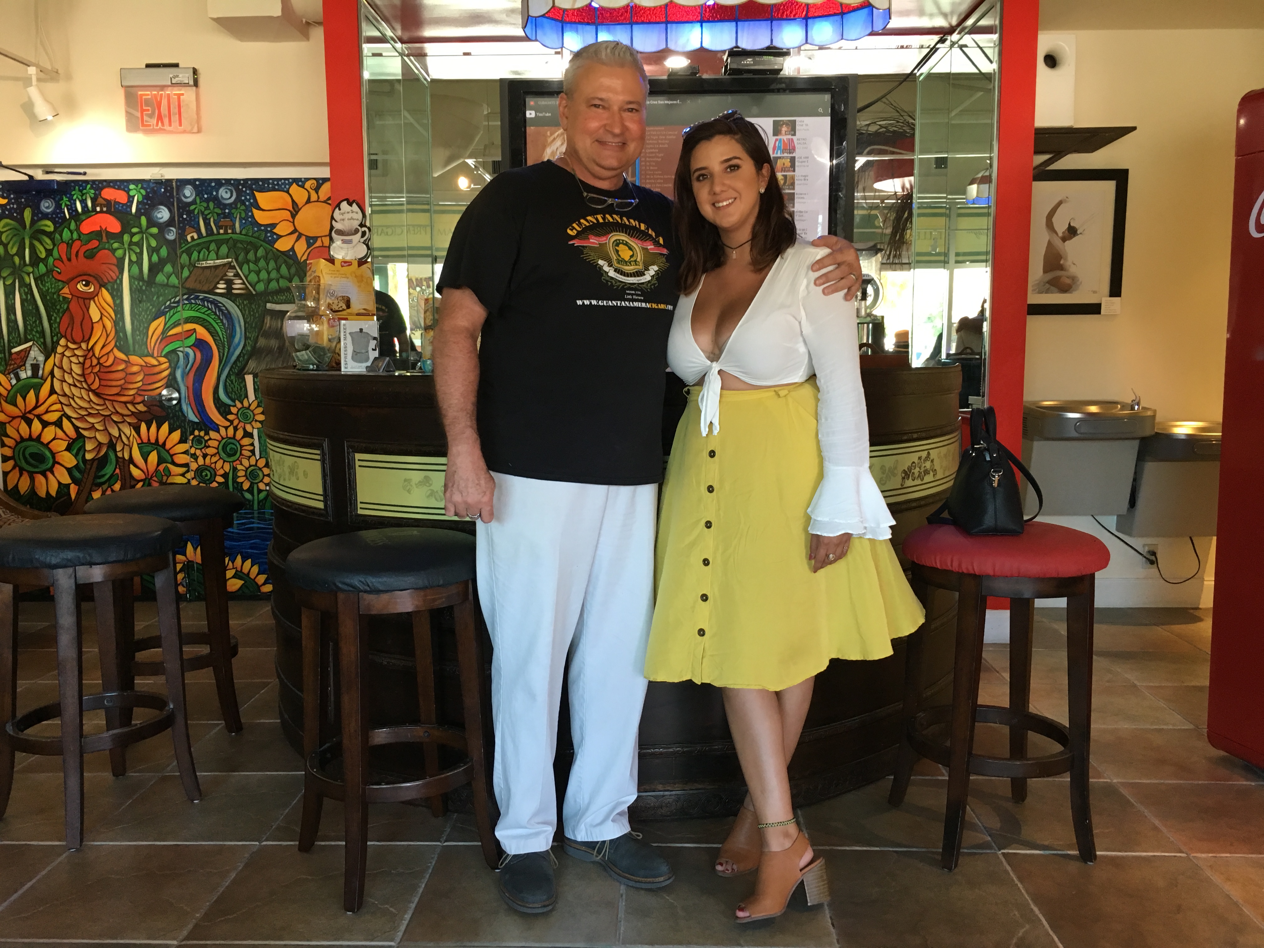 Former Chattanoogan Nikki Rios now leads tour groups through Miami's vibrant Little Havana neighborhood where one of her favorite stops is the Guantanamera cigar shop. Owner Luis, here with Rios, always makes fresh coffee for his guests. She is producing and hosting her own web series that compares Chattanooga millennials' lifestyles, passions and careers to those of 20-somethings in Cuba.