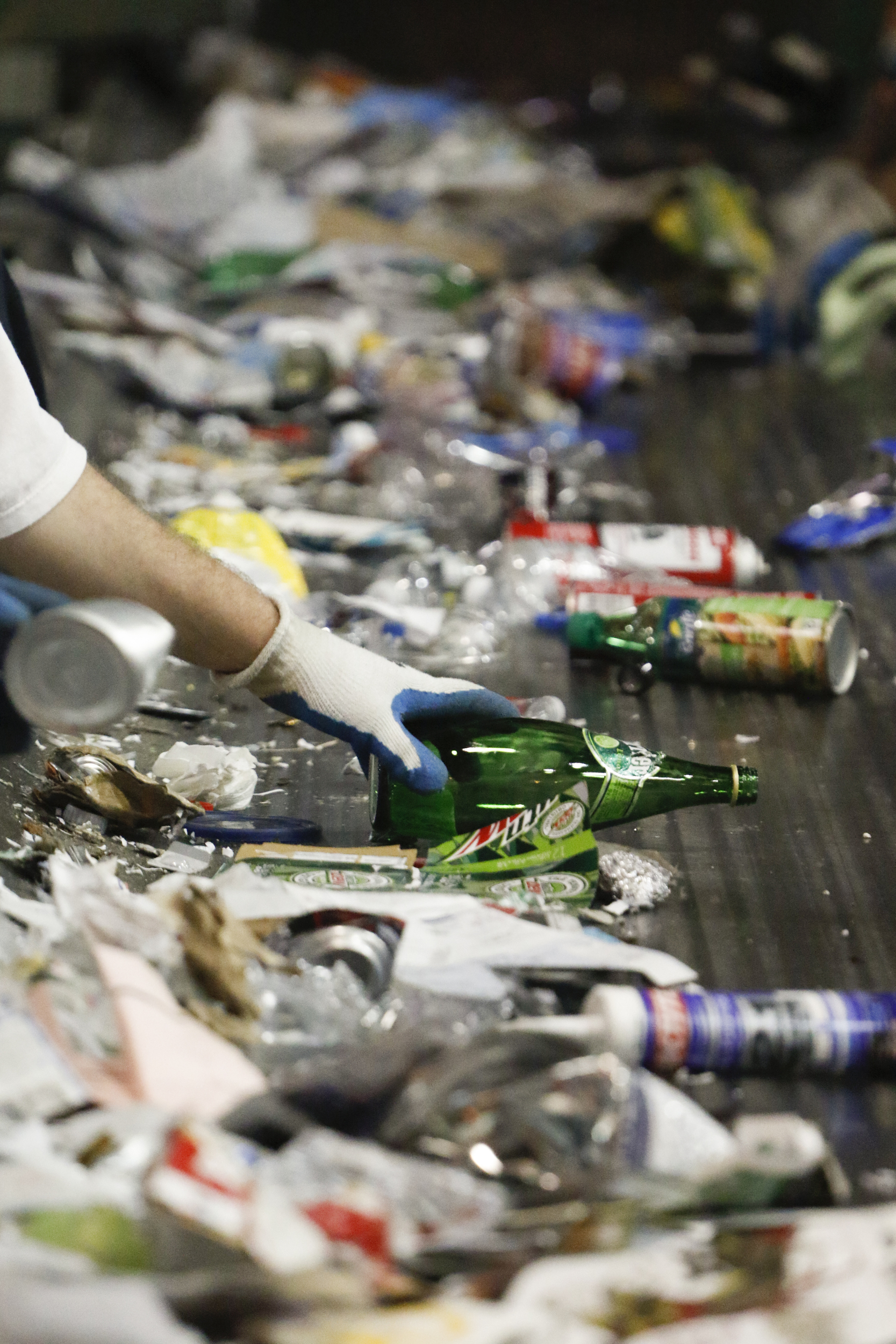 Staff Photo by Dan Henry / The Chattanooga Times Free Press- 7/6/16. Individuals with intellectual and or developmental disabilities sort items to be recycled at the Orange Grove Material Recovery Facility on Wednesday, June 6, 2016. Orange Grove officials are looking for new employment opportunities for their workers after a new law will force the facility to shut down.