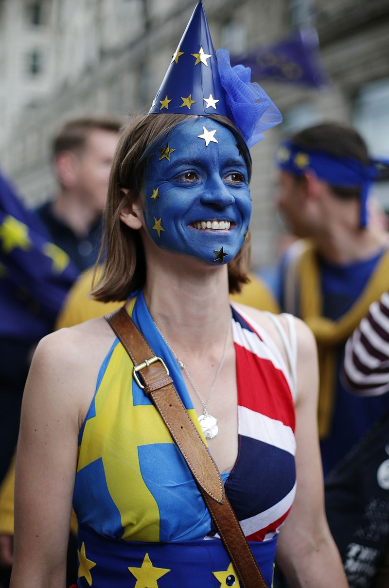 A "Remain" supporter wearing face paint and European flags takes part in the March for Europe rally in Parliament Square, London to show support for the European Union in the wake of the referendum decision for Britain to leave the EU, known as "Brexit."