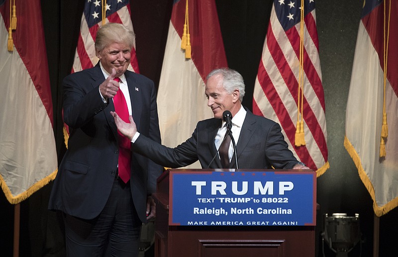 Sen. Bob Corker (R-Tenn.) gets a thumbs-up from Donald Trump at the presumptive Republican nominee's campaign event in Raleigh, N.C. (Stephen Crowley/The New York Times)
