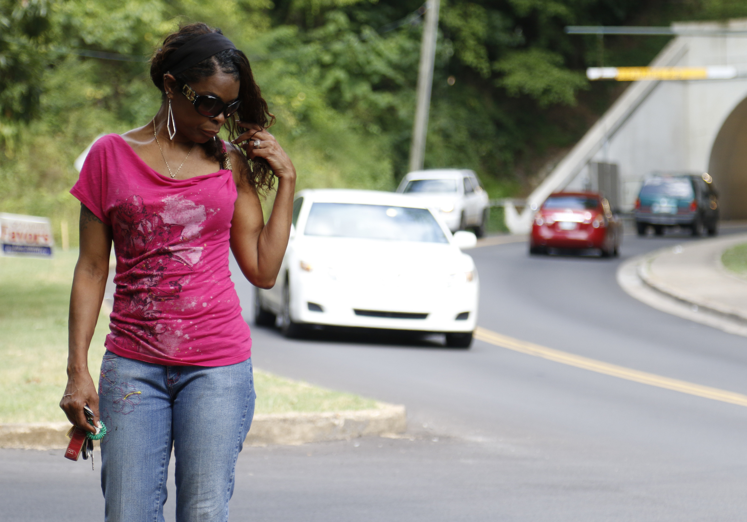 Justine Jones mourns her son Justin LaVon Trimble at the scene of the accident where he lost control of his motorcycle upon exiting the Wilcox Tunnel a month ago.
