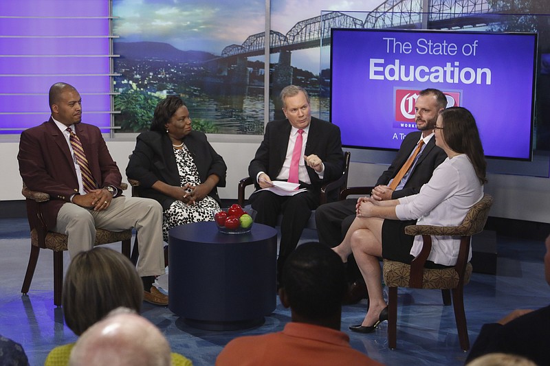 Staff Photo by Dan Henry / The Chattanooga Times Free Press- 7/7/16. David Carroll, center, moderates as Howard Principal Chris Earl, Public Education Foundation representative Edna Varner, Jared Bigham with Chattanooga 2.0 and Elizabeth Crews with UnifiED, from left, discuss Parent and Community Involvement in the Hamilton County school system during the "State of Education: A Town Hall Meeting" forum held at WRCB in conjunction with the Chattanooga Times Free Press on Thursday, July 7, 2016. 