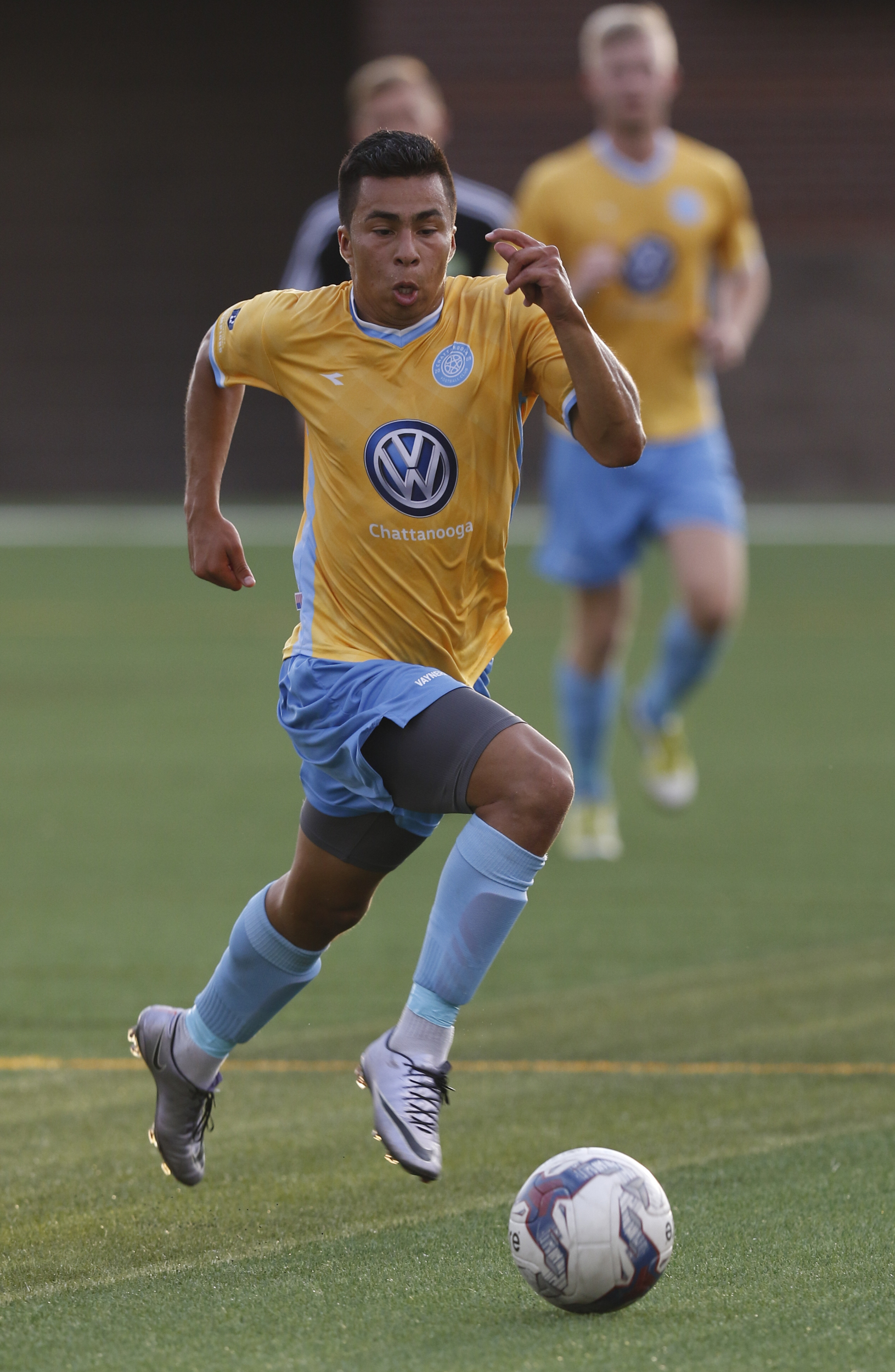 Staff Photo by Dan Henry / The Chattanooga Times Free Press- 7/8/16. Chattanooga Football Club's David Perez (13) dribbles upfield while playing Knoxville during the first half of play at Finley Stadium on Friday, July 8, 2016.