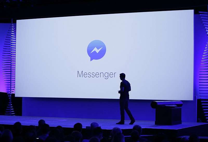 
              FILE - In this Tuesday, April 12, 2016 file photo, David Marcus, Facebook Vice President of Messaging Products, watches a display showing new features of Messenger during the keynote address at the F8 Facebook Developer Conference in San Francisco. On Friday, July 8, 2016, the company says it is testing an option for “secret conversations,” encrypted chats that can only be read by the people sending and receiving the messages, to its Messenger app. (AP Photo/Eric Risberg)
            