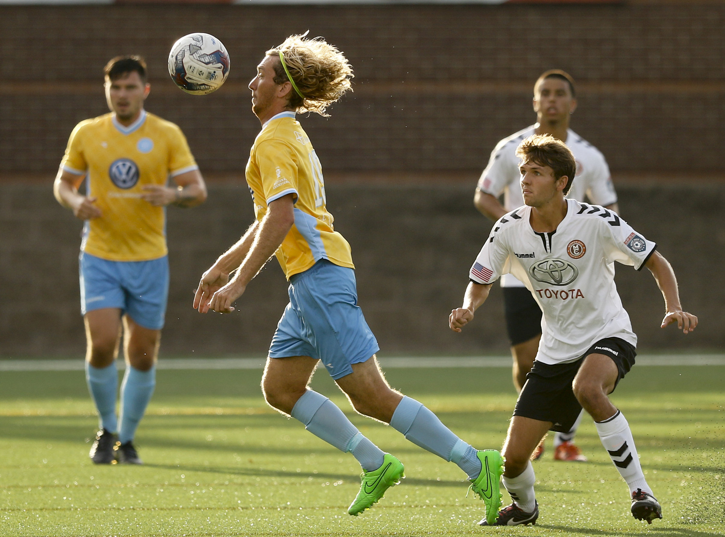 CFC's Juan Hernandez Mendizabal, center, stops the ball ahead of Memphis's Blake Lashlee during Chattanooga FC's playoff match against Memphis City at Finley Stadium on Saturday, July 9, 2016, in Chattanooga, Tenn.