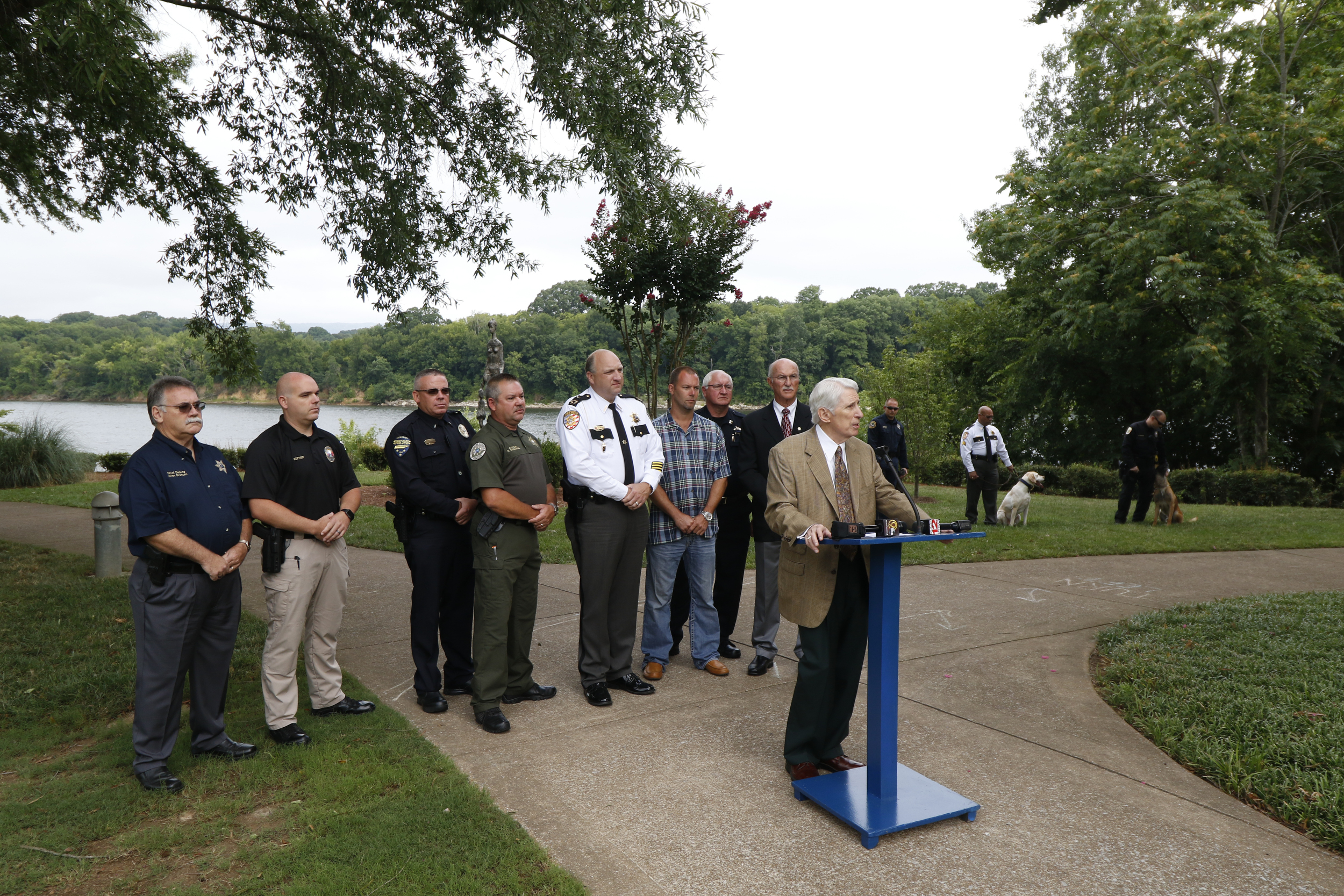 Staff Photo by Dan Henry / The Chattanooga Times Free Press- 7/11/16. Tom Edd Wilson, president of the AEGIS Law Enforcement Foundation, speaks during a press conference at the Tennessee Riverpark announcing that twelve new bullet proof vests have been purchased by the Miller Family Foundation for local area K9 law enforcement officers.