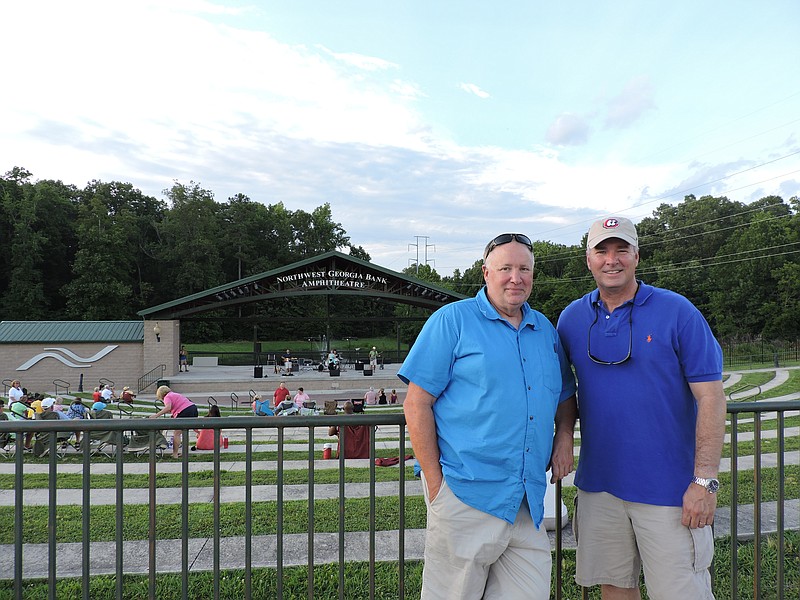 Catoosa County Parks and Recreation Director Randy Wilson, left, and County Manager Jim Walker welcome the community to the first-ever Park Rhythms Concert Series, held every Thursday night in July at Northwest Georgia Bank Amphitheatre in Ringgold.