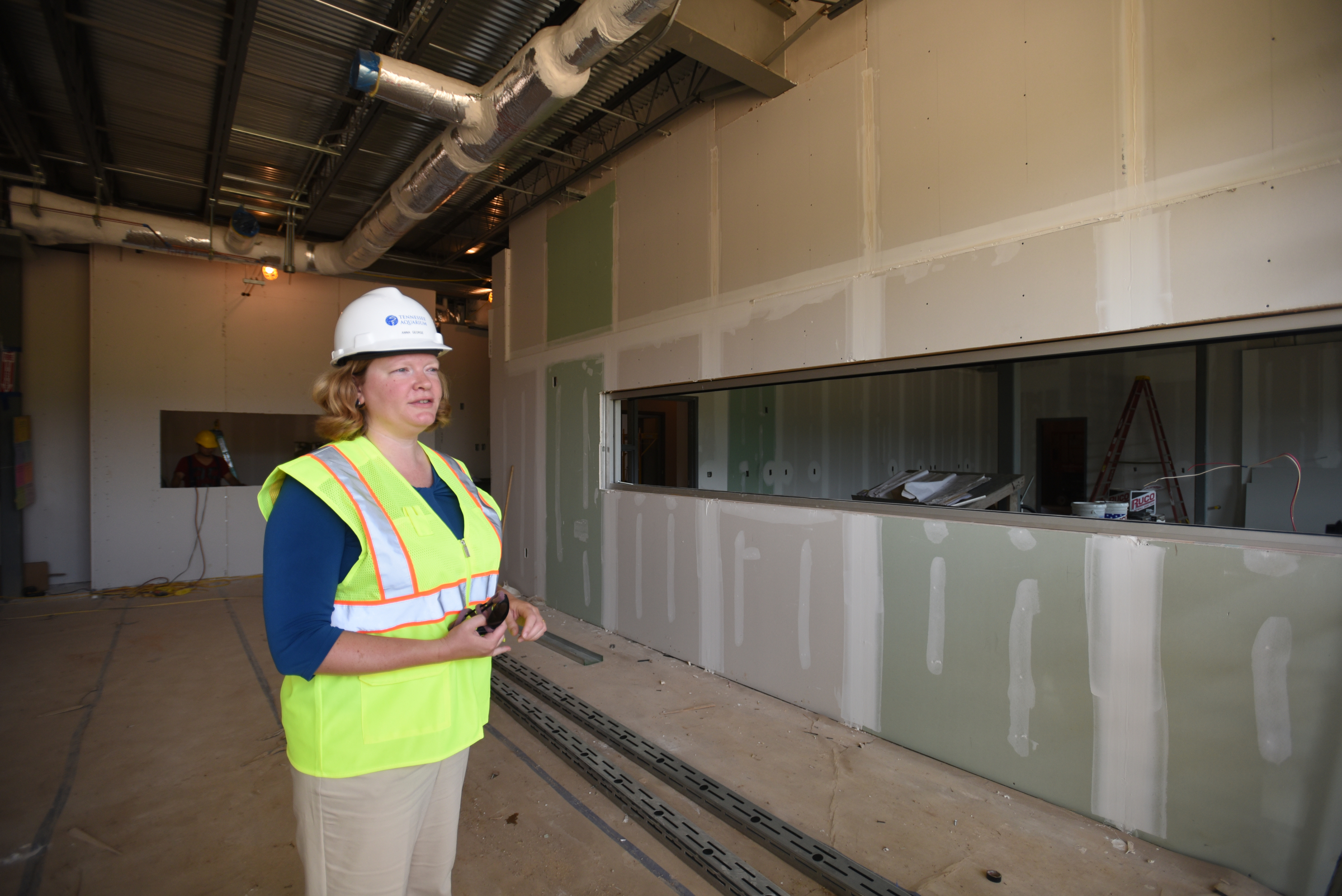 Center director Anna George leads a tour Tuesday, July 12, 2016, at the new Tennessee Aquarium Conservation Institute near Baylor School.