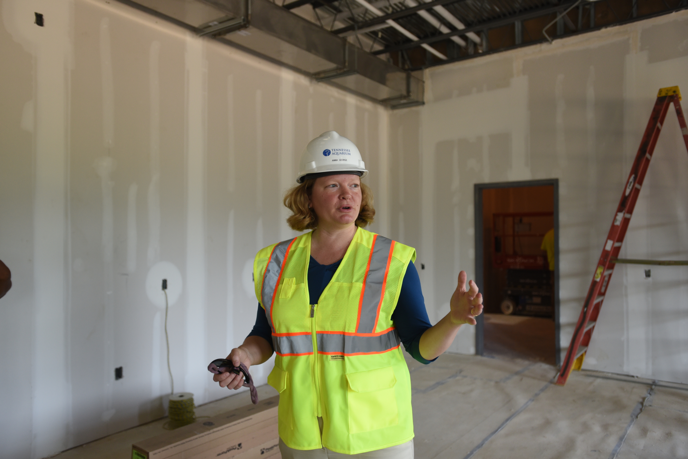 Center director Anna George leads a tour Tuesday, July 12, 2016, at the new Tennessee Aquarium Conservation Institute near Baylor School.