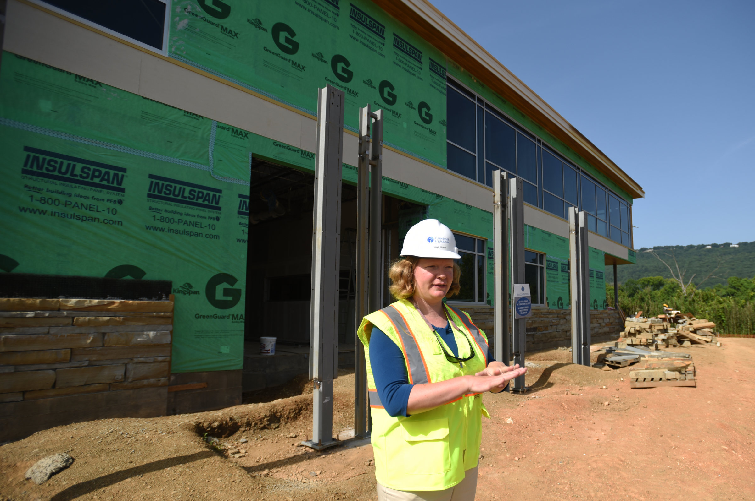 Center director Anna George leads a tour Tuesday, July 12, 2016, at the new Tennessee Aquarium Conservation Institute near Baylor School.