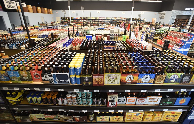 Beer fills the shelves Tuesday, July 12, 2016, at Chattanooga Wine and Spirits.