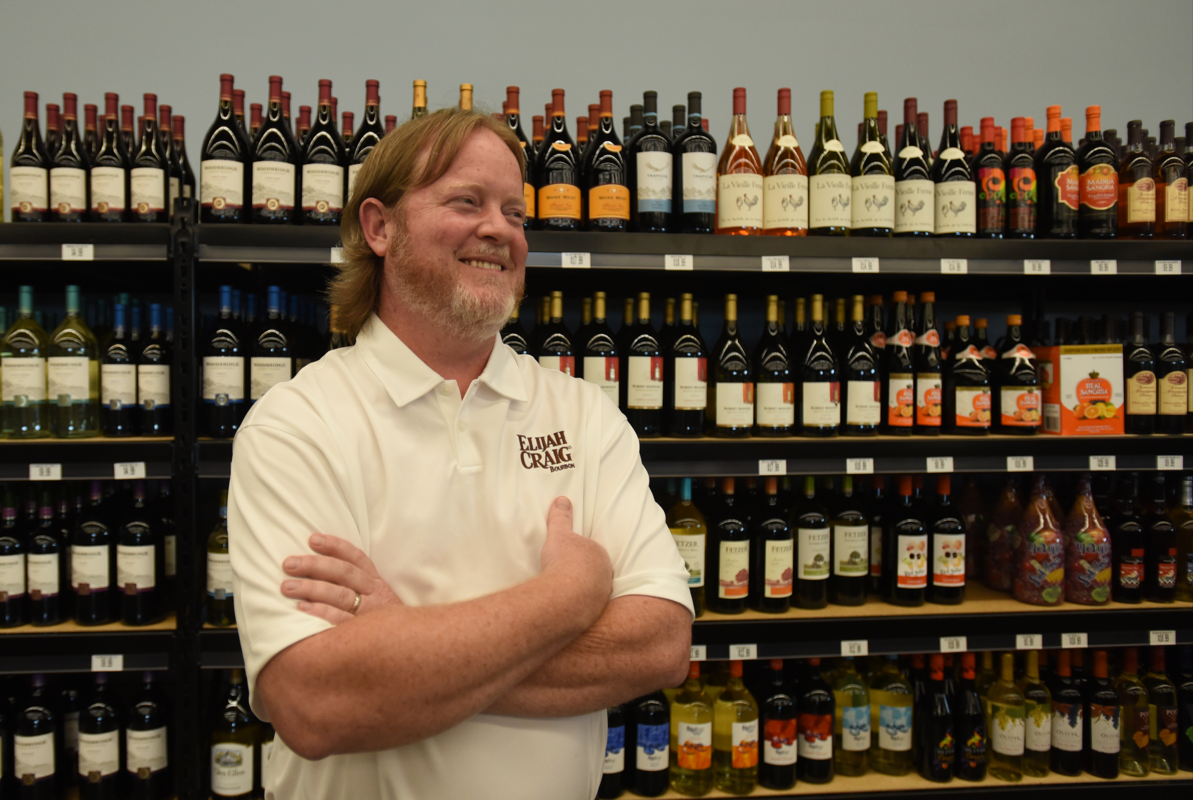 General manager Chris Ross talks about wines Tuesday, July 12, 2016, at Chattanooga Wine and Spirits.