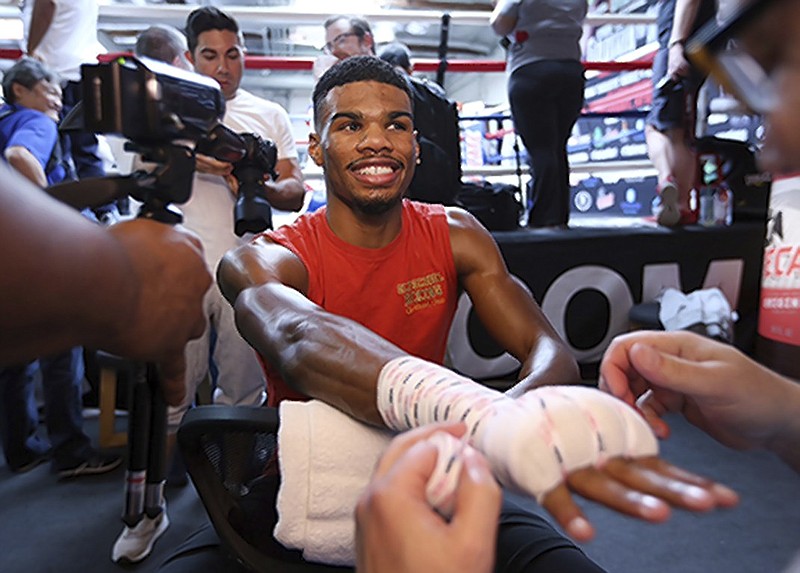 Chattanooga native Ryan Martin is all smiles as he thinks of showcasing his 14-0 professional boxing record in a Saturday bout in Birmingham, Ala.