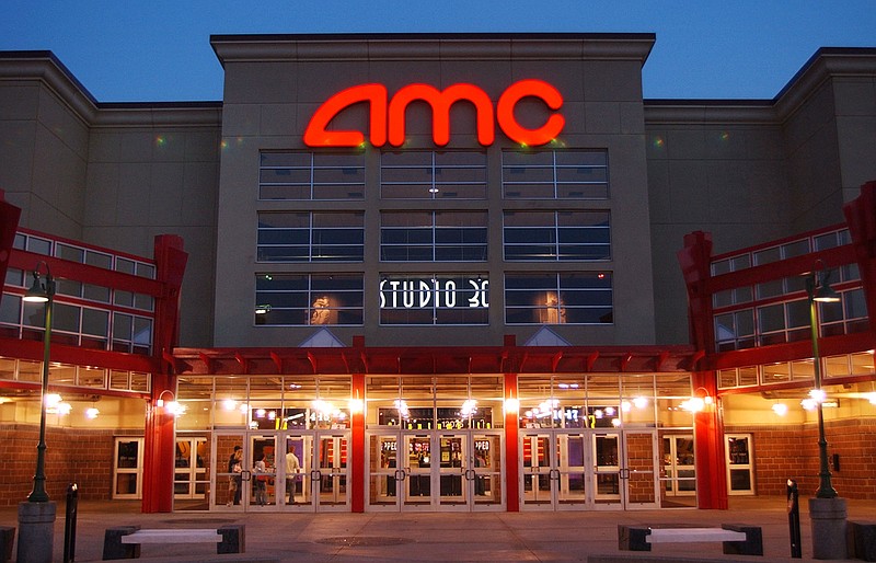 
              FILE - In this May 11,2005 file photo, people enter AMC's Studio 30 theater in Olathe, Kan. AMC Theatres is buying European movie theater operator Odeon & UCI Cinemas Group in a deal valued at about 921 million pounds ($1.21 billion). AMC says, Tuesday, July 12, 2016,  that the transaction will make it the biggest movie theater operator in the world. Odeon & UCI has 242 theaters in Europe. The deal will give AMC a total of 627 theaters in eight countries. (AP Photo/Orlin Wagner)
            