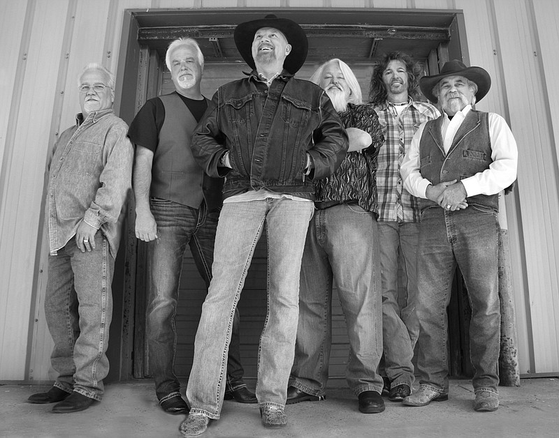Confederate Railroad founder and vocalist Danny Shirley, center front, says he thought he was retiring from music, but the industry wouldn't let him.