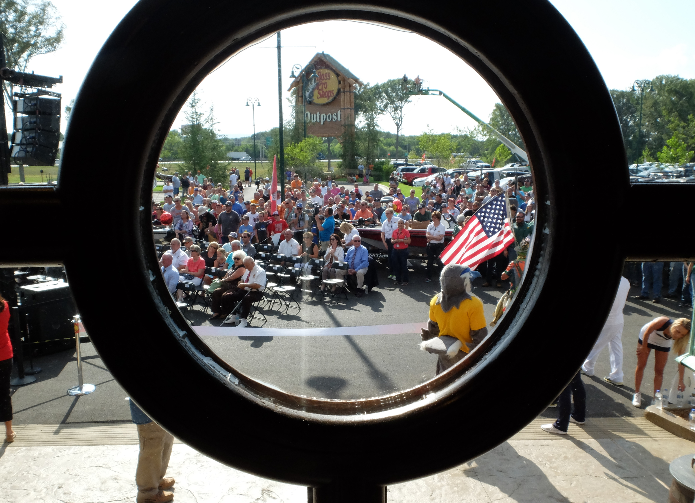 Hundreds gather outside the 85,000-square-foot Bass Pro Shops Outpost for the opening ceremony in East Ridge late Wednesday.