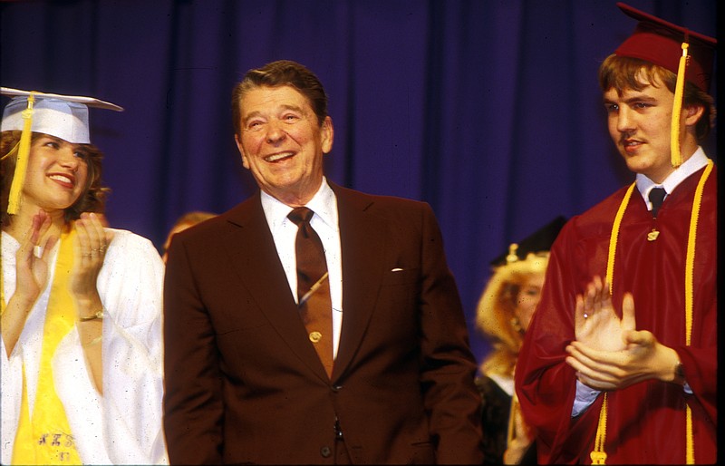 President Ronald Reagan is applauded by high school students during a vist to the University of Tennessee at Chattanooga in 1987.