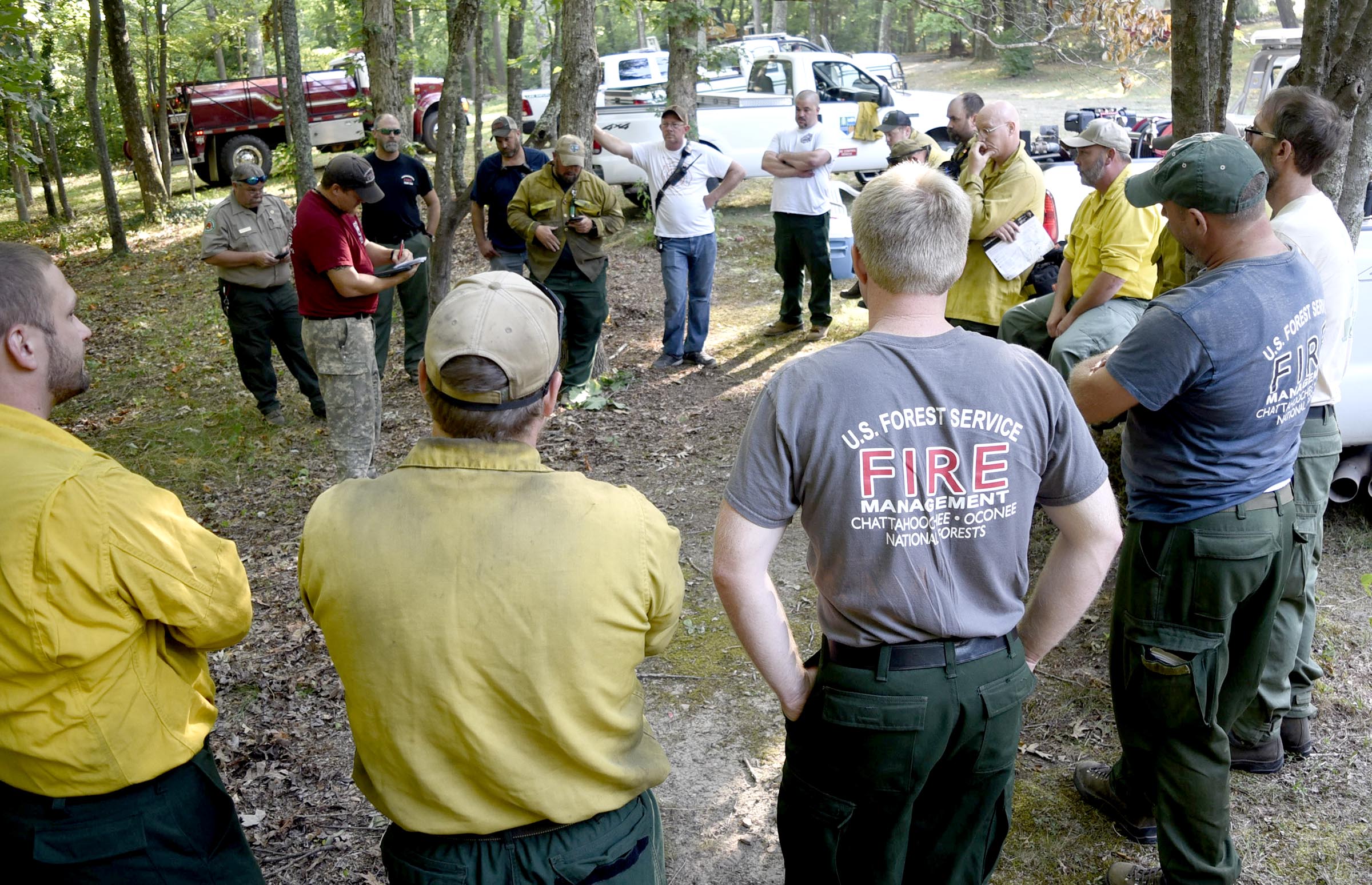 Staff Photo by Robin RuddForestry fire management officers meet to coordinate efforts before embarking to fight the fire on Lookout Mountain.  Multiple agencies united to fight a wildfire on the west slope of Lookout Mountain below Covenant College Thursday July 14, 2016.