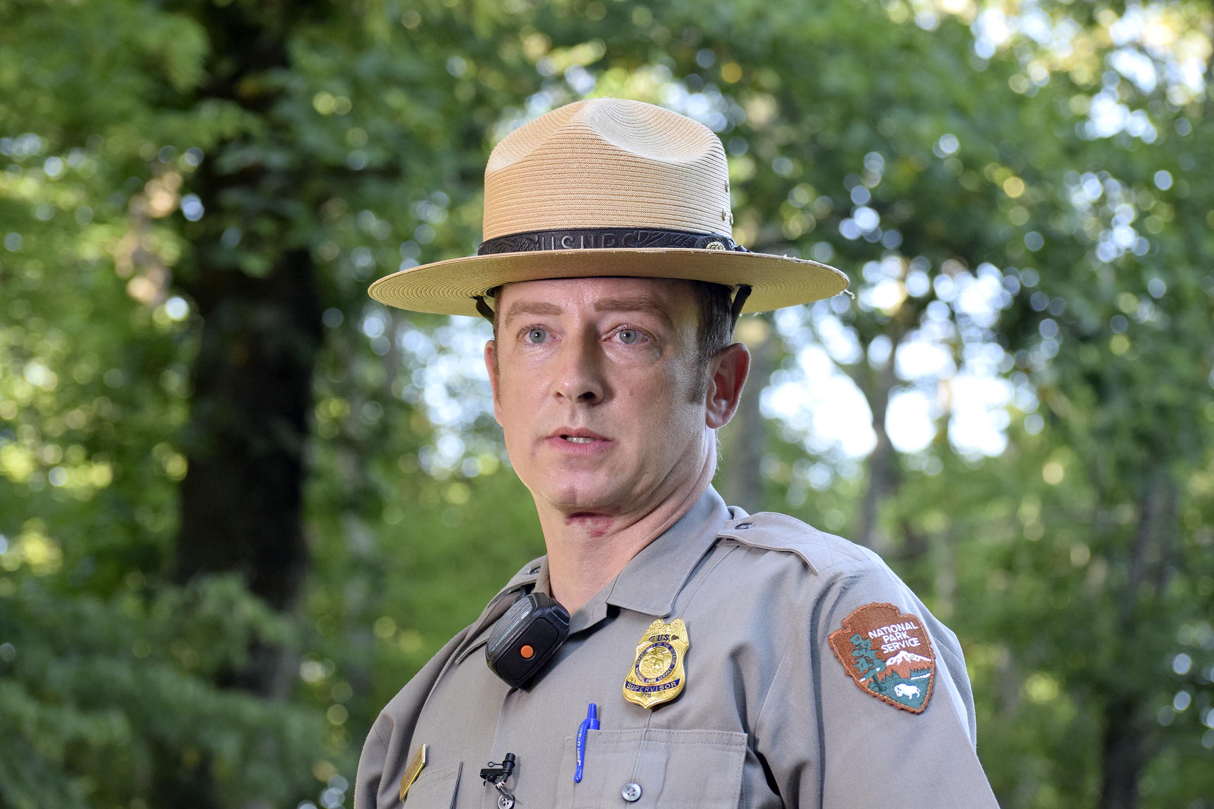 Acting Cheif Ranger, John McCutcheon, of the National Park Services Chickmauaga and Chattanooga National Military Park addresses the media atop to contain the wildfire.  Multiple agencies united to fight a wildfire on the west slope of Lookout Mountain below Covenant College Thursday July 14, 2016.