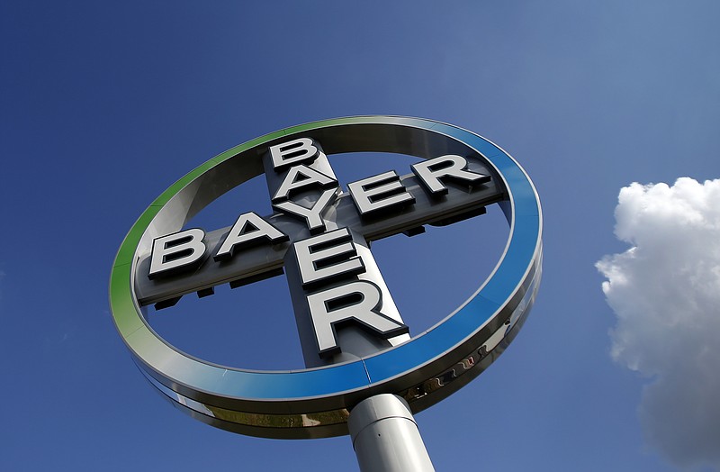 
              FILE - The Oct. 2, 2013 file photo shows the logo of Bayer at the Berlin Brandenburg Airport in Schoenefeld, Germany.  German drug and chemicals firm Bayer says it has increased its offer for U.S. seed company Monsanto Co. to US$125 per share from its initial bid of US$122 per share. Bayer AG said Thursday July 14, 2016  that the revised all-cash offer follows several weeks of private talks with Monsanto. (AP Photo/Michael Sohn, File)
            
