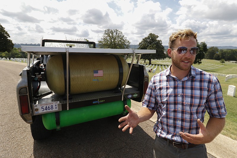 Staff Photo by Dan Henry / The Chattanooga Times Free Press- 7/15/16. Joshua Kappellusch speaks about he outfitted his 1972 Chevrolet Blazer to run on five different fuels while at the Chattanooga National Cemetery on Friday, July 15, 2016. Kappellusch plans to take a cross country trip honoring Chattanooga's Fallen Five using gasoline, propane, natural gas, E85 and solar power to complete the trip. 