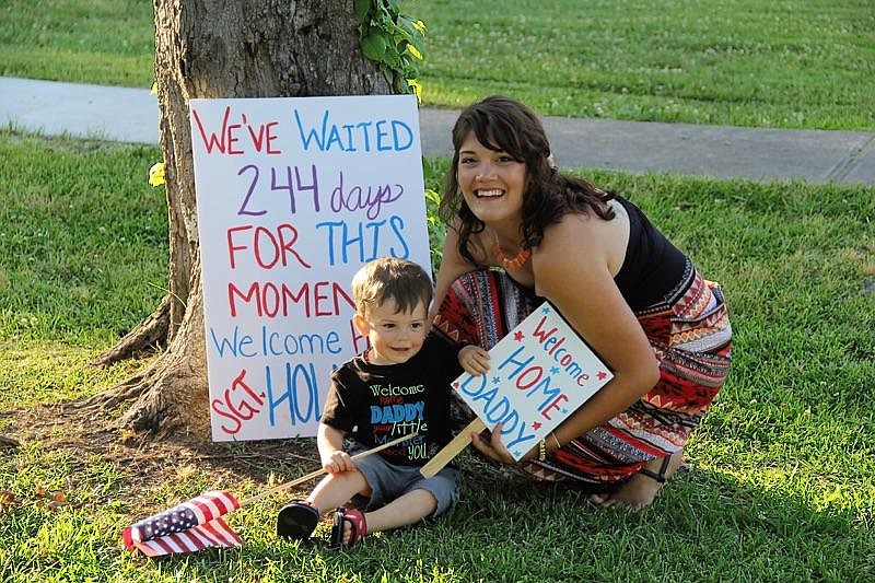 Jasmine Holmquist and her son, Wyatt Holmquist, prepare for Carson Holmquist's return home. Carson Holmquist was killed during the July 16, 2015, terrorist attack in Chattanooga. 