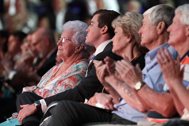 Hazel Albright Head, left, mother of Pat Summitt, sits with Summitt's son, Tyler Summitt, center, and Summitt's sister, Linda Attebery, third from left, during a ceremony to celebrate the life of former Tennessee women's basketball coach Pat Summitt, Thursday, July 14, 2016, in Knoxville, Tenn. Summitt died June 28 at the age of 64. (AP Photo/Mark Humphrey, Pool)