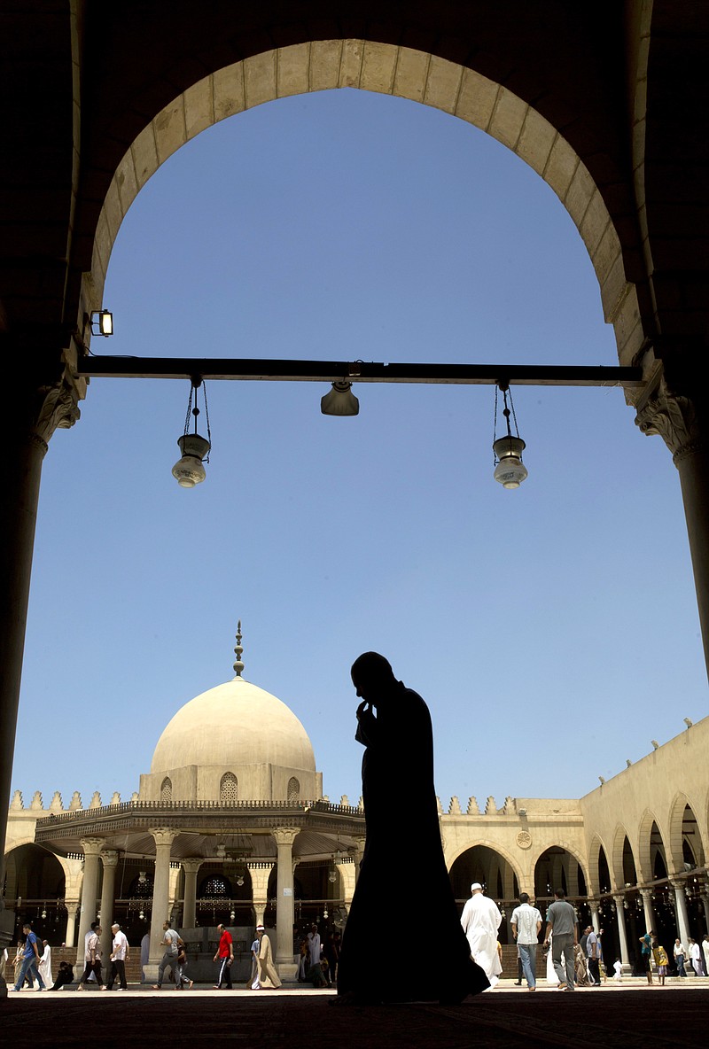 
              Egyptian worshippers leave Friday prayers at Amr Ibn al-As mosque, in Cairo, Egypt, Friday, July 15, 2016. The government is promoting the standardized sermons as part of its efforts to reform the religious discourse and curbing extremism. (AP Photo/Amr Nabil)
            