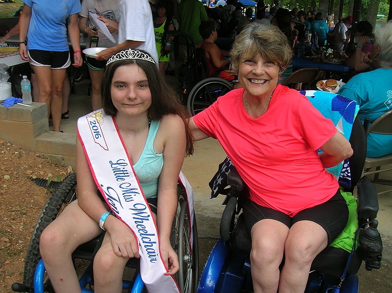 Little Miss Wheelchair Tennessee Liberty Barnum and Ms. Wheelchair Tennessee runner-up Cyndi Leach were among the first-time skiers Saturday at SPARC's annual water sports day at Possum Creek.