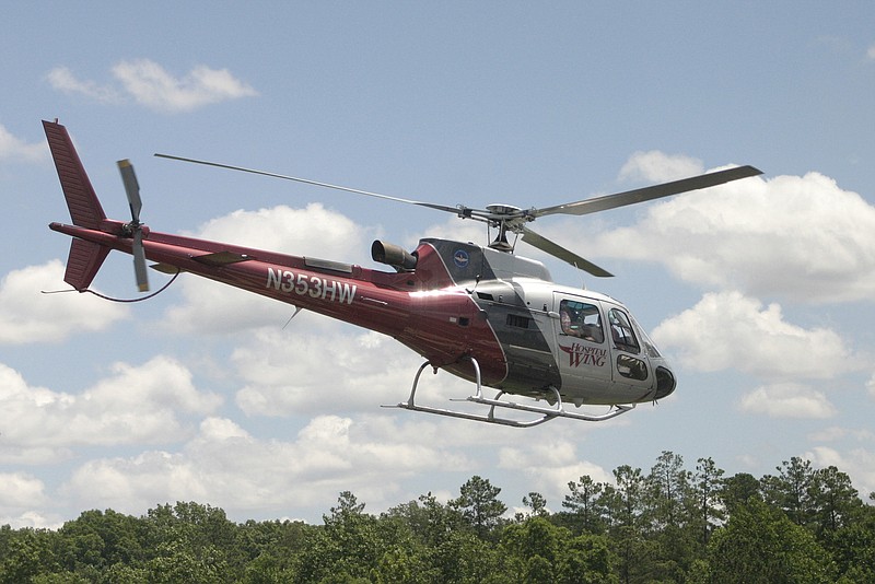 In this June 23, 2010  photo, a new Hospital Wing helicopter takes off from Robert Sibley Airport in McNairy County after an announcement was made about a base being built for the emergency medical transport company in Selmer, Tenn. (AP Photo/The Jackson Sun, Katie Brake)