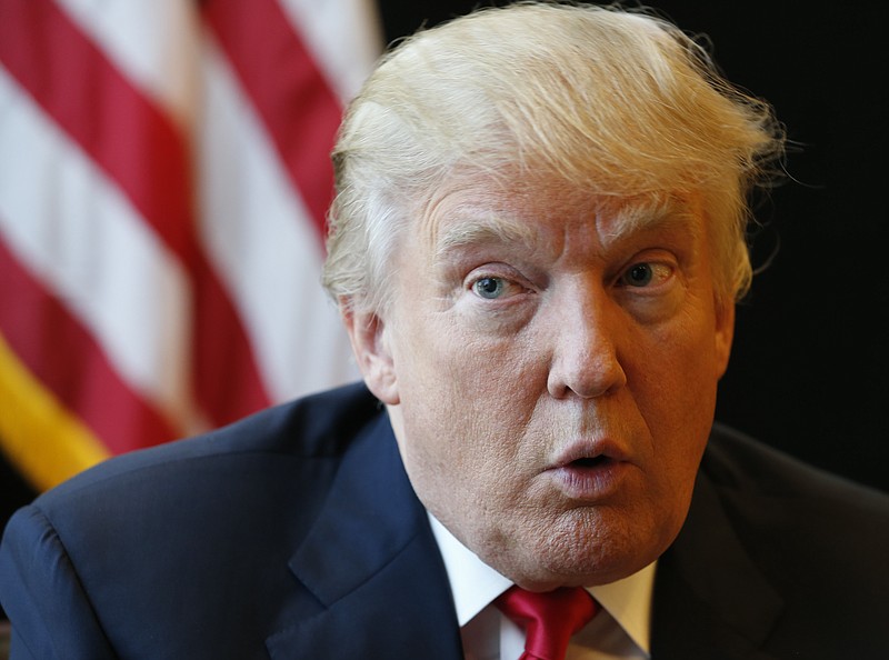 
              In this photo taken July 11, 2016, Republican Presidential candidate Donald Trump answers a question during an interview in Virginia Beach, Va. Americans have mixed feelings on which presidential candidate will do better on key issues like health care, trade, the economy and terrorism. But when they simply consider whether they personally would be better off, they prefer Hillary Clinton.  (AP Photo/Steve Helber)
            
