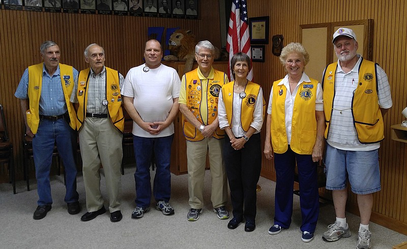 The Lions Club inaugurated Judy Bratcher as their new president on July 15. From left to right, Ted Bratcher, David Hafley, Albert Davis, Bud Rohen, Sherry Kitts, Judy Bratcher and Doyle Johnston.
