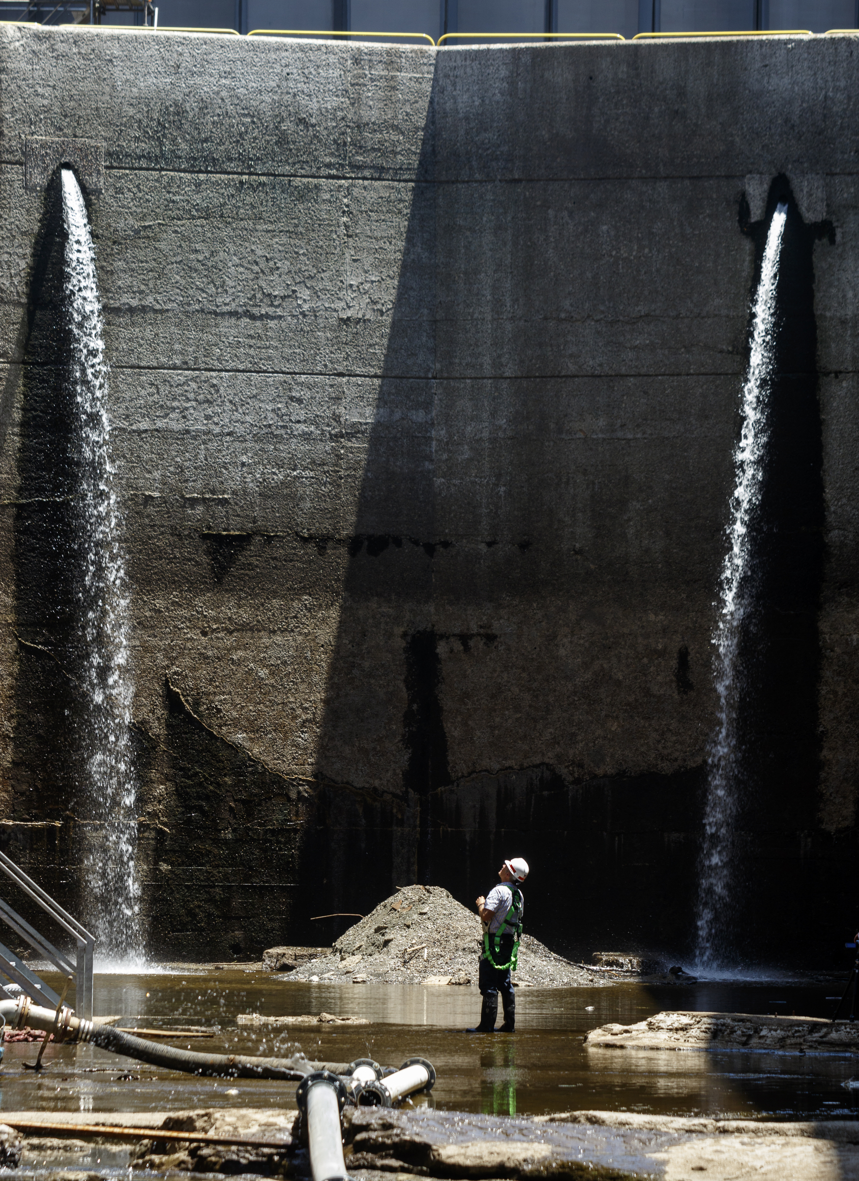 Tom Hale, Army Corps of Engineers operations manager for the Tennessee River navigation area, stands inside the dewatered Chickamauga Lock at the Chickamauga Dam on Wednesday, July 20, 2016, in Chattanooga, Tenn. The lock is being dewatered for routine maintenance checks.