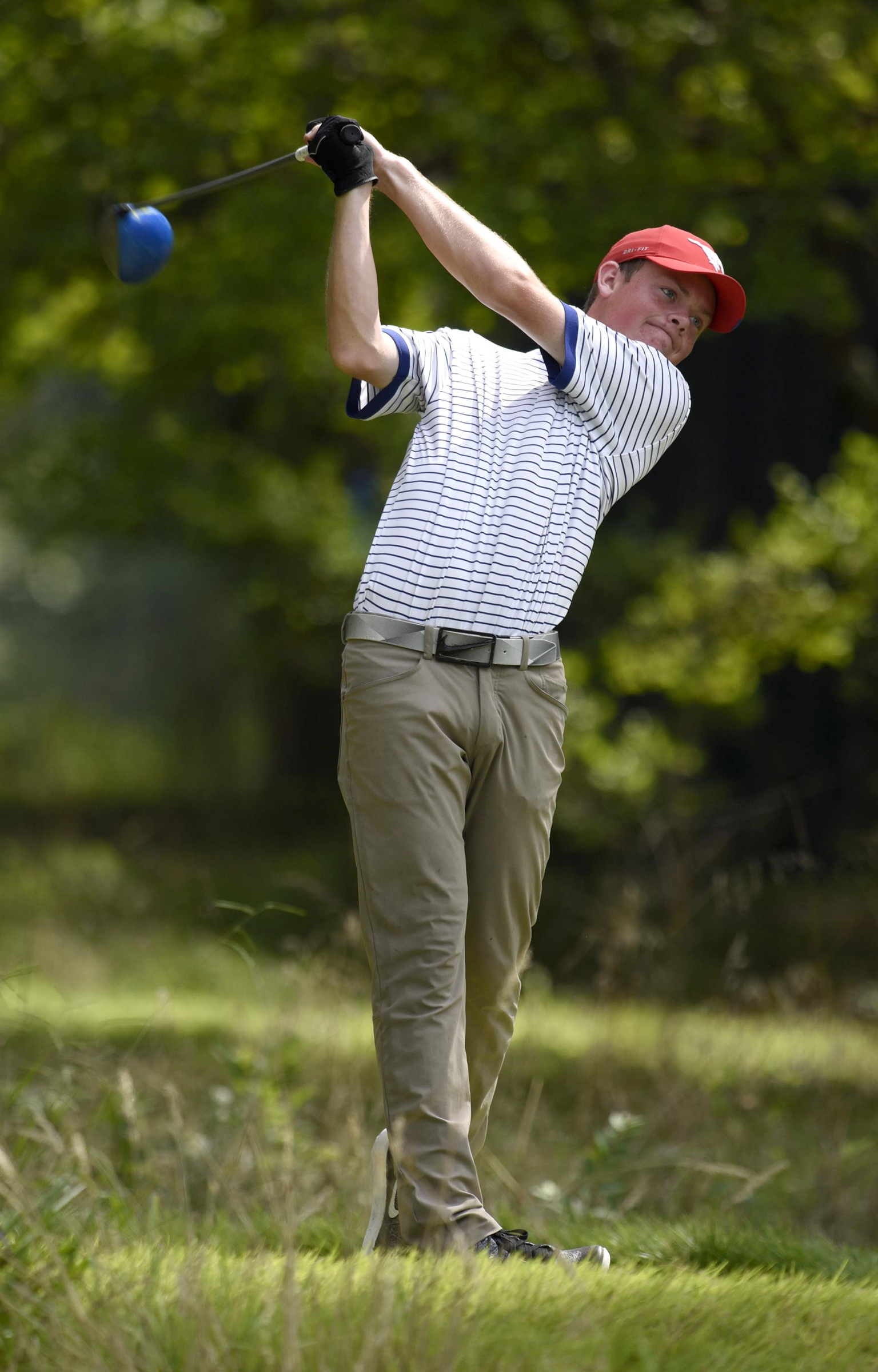 Joe Highsmith of Lakewood, Washington follows through on his drive at the 6th hole. The third day of the 69th U.S. Junior Amateur Championship was held at the Honors Course in Ooltewah, Tennessee, Wednesday July 20, 2016.