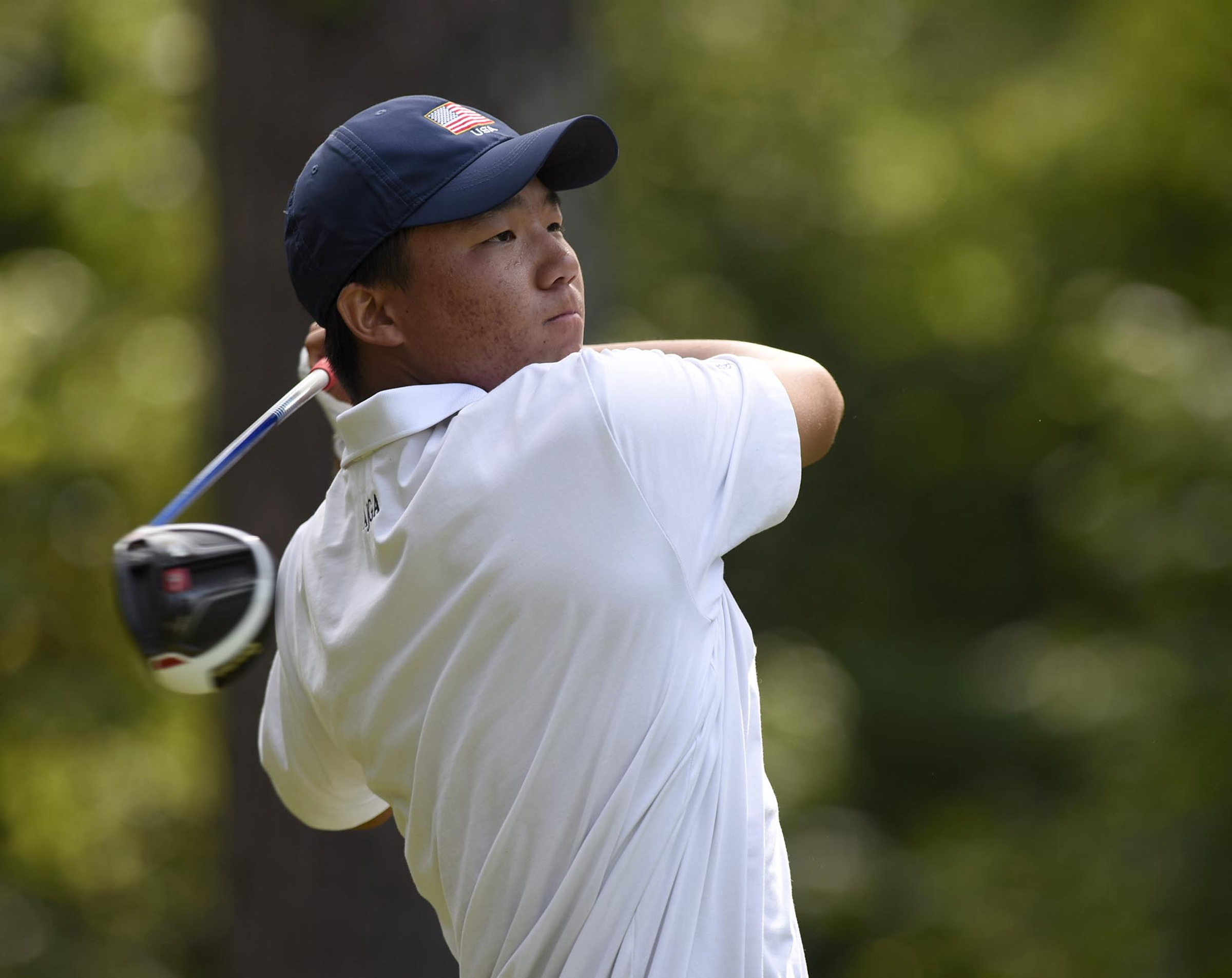 Norman Xiong of Canyon Lake, California ties off on the 6th hole. Xiong went on to defeat James Song of Canada 5 and 4. The third day of the 69th U.S. Junior Amateur Championship was held at the Honors Course in Ooltewah, Tennessee, Wednesday July 20, 2016.