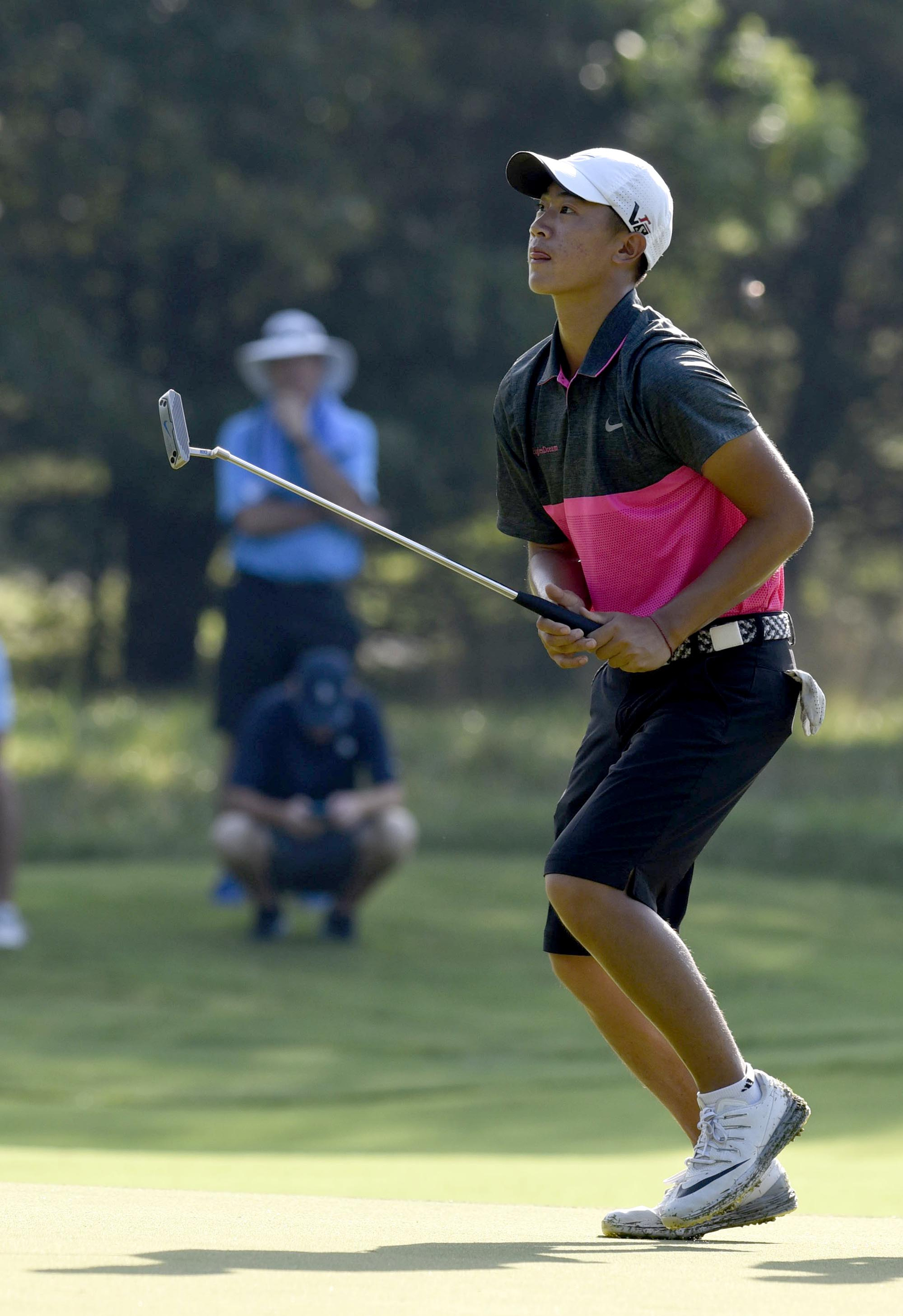Wocheng Ye of the People's Republic of China reacts to missing a putt on the 4th hole. The third day of the 69th U.S. Junior Amateur Championship was held at the Honors Course in Ooltewah, Tennessee, Wednesday July 20, 2016.