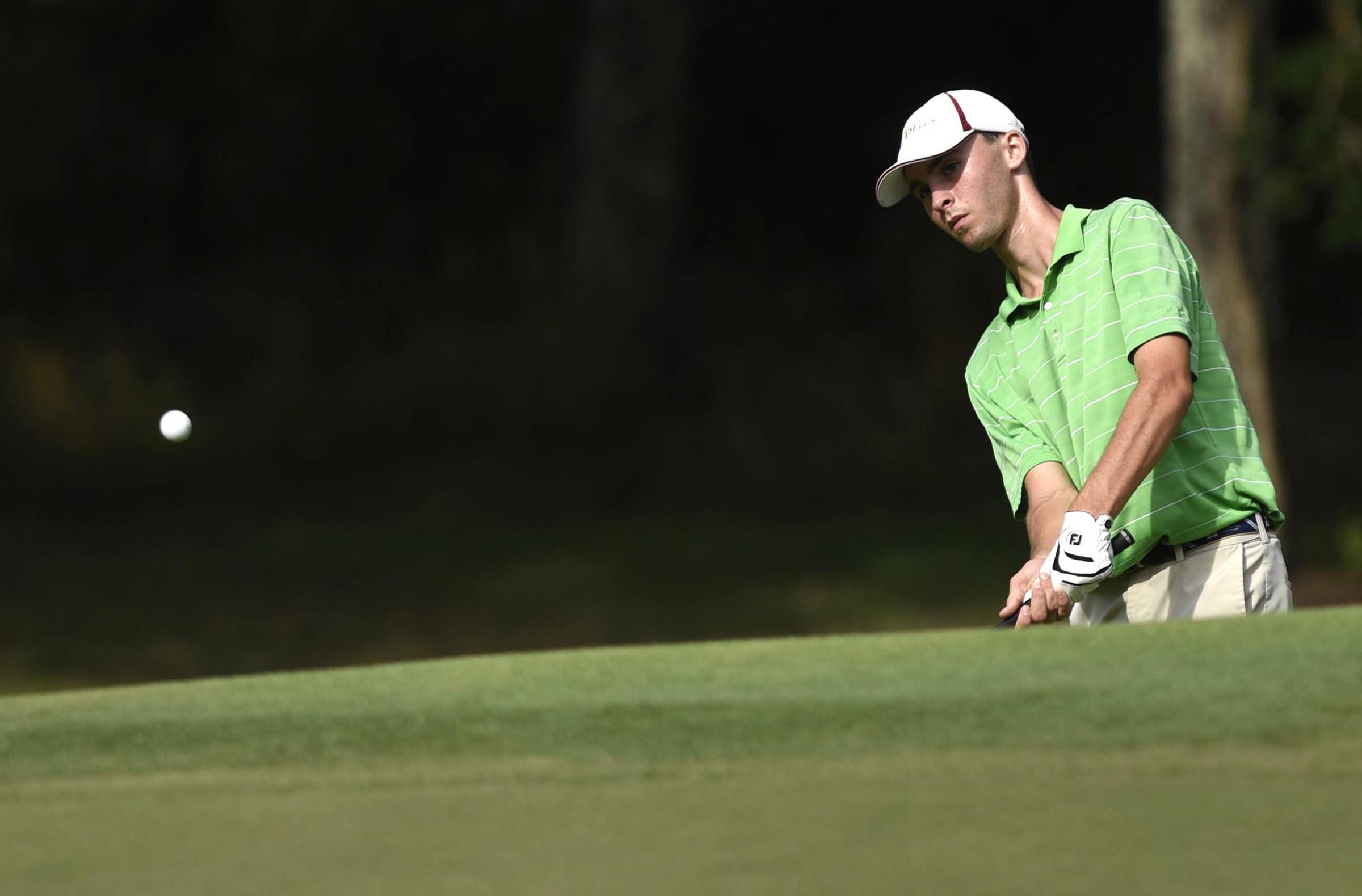 Nicholas Lyerly of Salisbury, North Carolina chips onto the 5th green. The third day of the 69th U.S. Junior Amateur Championship was held at the Honors Course in Ooltewah, Tennessee, Wednesday July 20, 2016.