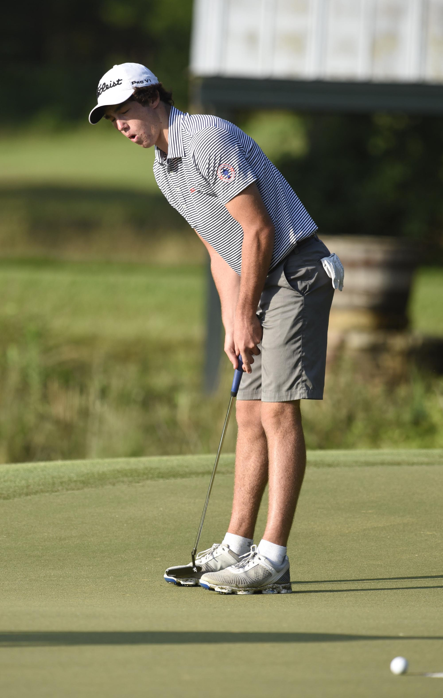 Chris Nido of Palmetto Bay, Florida reacts to his missed putt on the 11th hole during the early morning playoff. The third day of the 69th U.S. Junior Amateur Championship was held at the Honors Course in Ooltewah, Tennessee, Wednesday July 20, 2016.