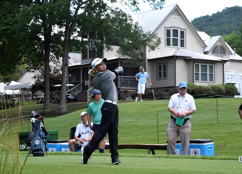 Wei Wei Gao of the Phillippines watches his drive on the 10th hole.  The Honors clubhouse is seen in the background.  The third day of the 69th U.S. Junior Amateur Championship was held at the Honors Course in Ooltewah, Tennessee, Wednesday July 20, 2016. 