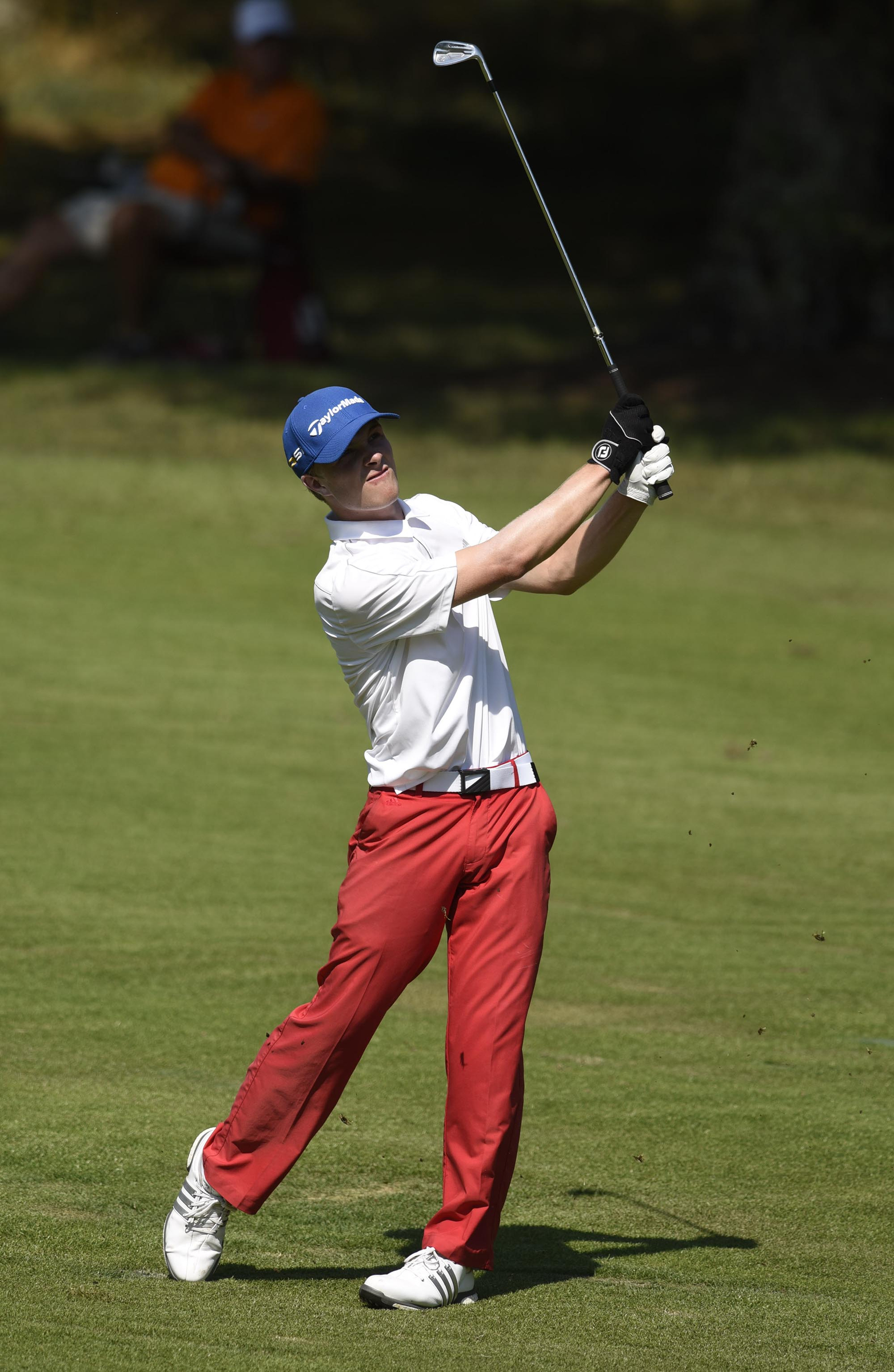 Chase Furey of Los Anegles, California chips onto the 18th green. Furey defeated South Africa's Garrick Higgo 1 up. The third day of the 69th U.S. Junior Amateur Championship was held at the Honors Course in Ooltewah, Tennessee, Wednesday July 20, 2016.