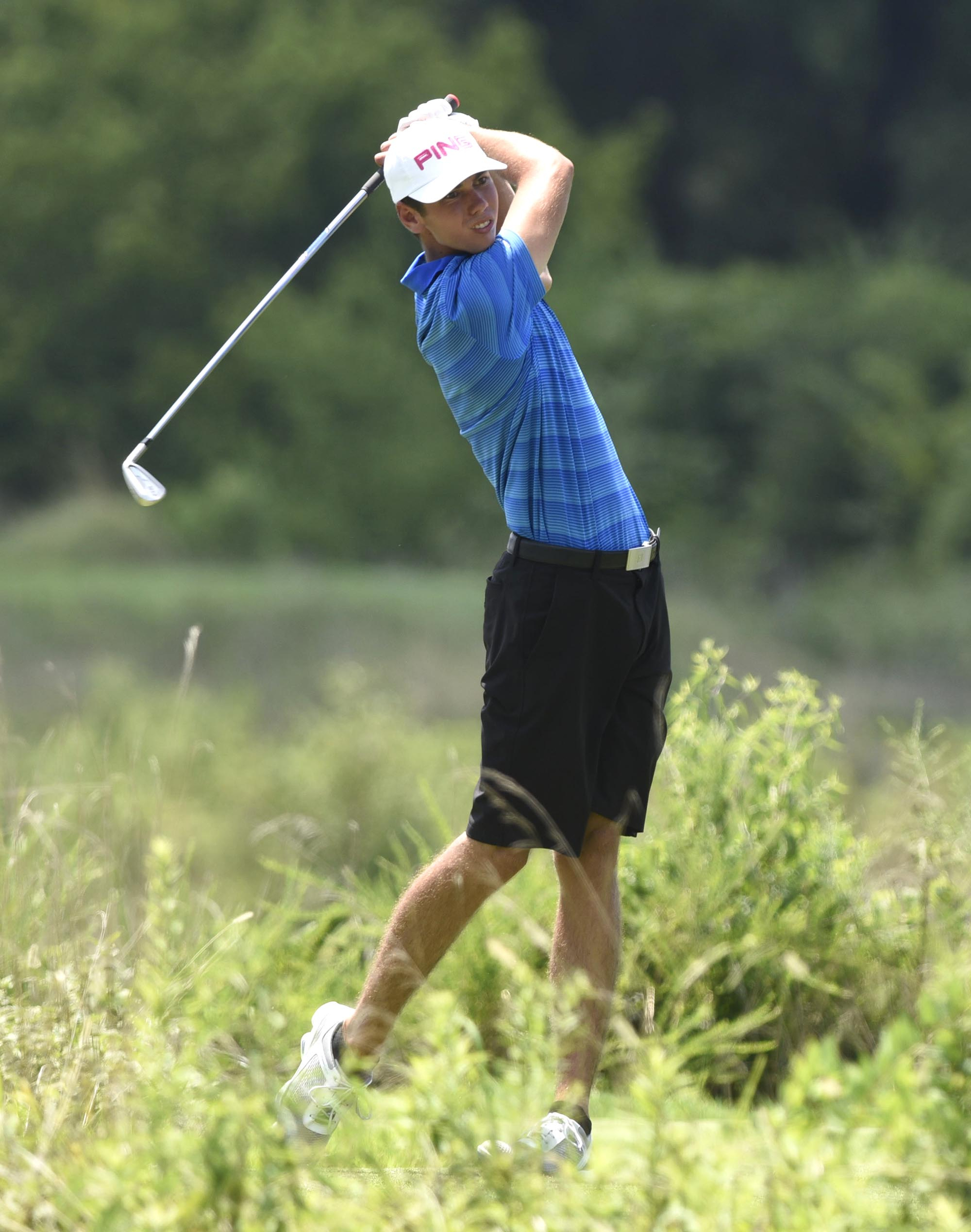 Kyle Robinson of Fayetteville, Arkansas watches his drive on the 9th hole. Robinson, who was seated 59, defeated 6th seat, Noah Norton of Chico, California 1 up. The third day of the 69th U.S. Junior Amateur Championship was held at the Honors Course in Ooltewah, Tennessee, Wednesday July 20, 2016.