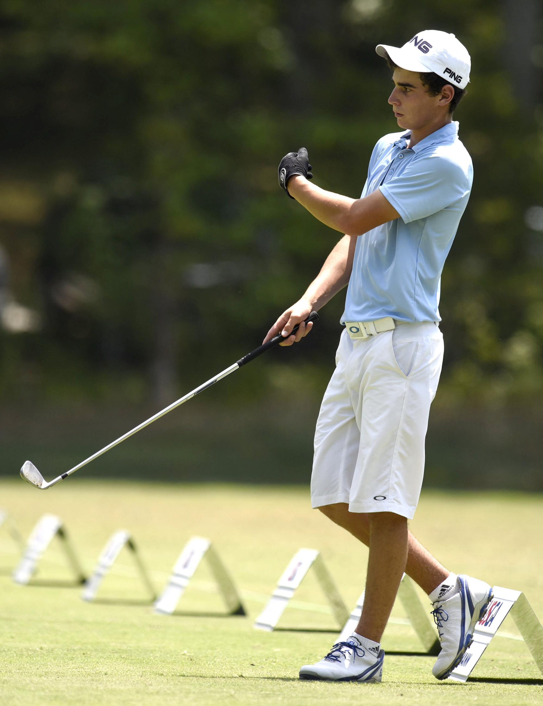 Joaquin Niemann of Chile works on the practice tee after his round. Niemann won 8 consecutive hole to defeat Tommy Kuhl of Morton Illinois 7 and 5. The third day of the 69th U.S. Junior Amateur Championship was held at the Honors Course in Ooltewah, Tennessee, Wednesday July 20, 2016.