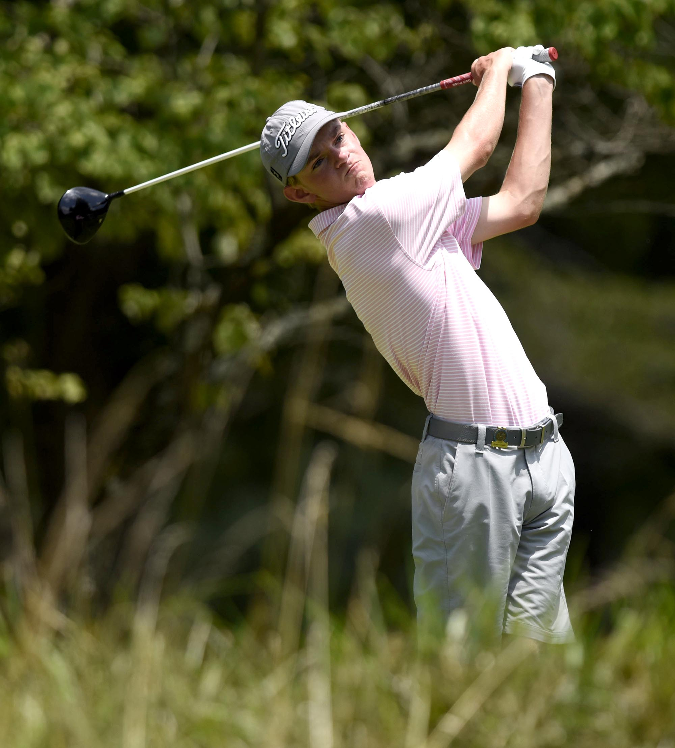 Austin Coggin of Vestavia Hills, Alabama tees off on the 10th hole. Coggin defeated Kaito Onishi of Japan in 19 holes. The third day of the 69th U.S. Junior Amateur Championship was held at the Honors Course in Ooltewah, Tennessee, Wednesday July 20, 2016.