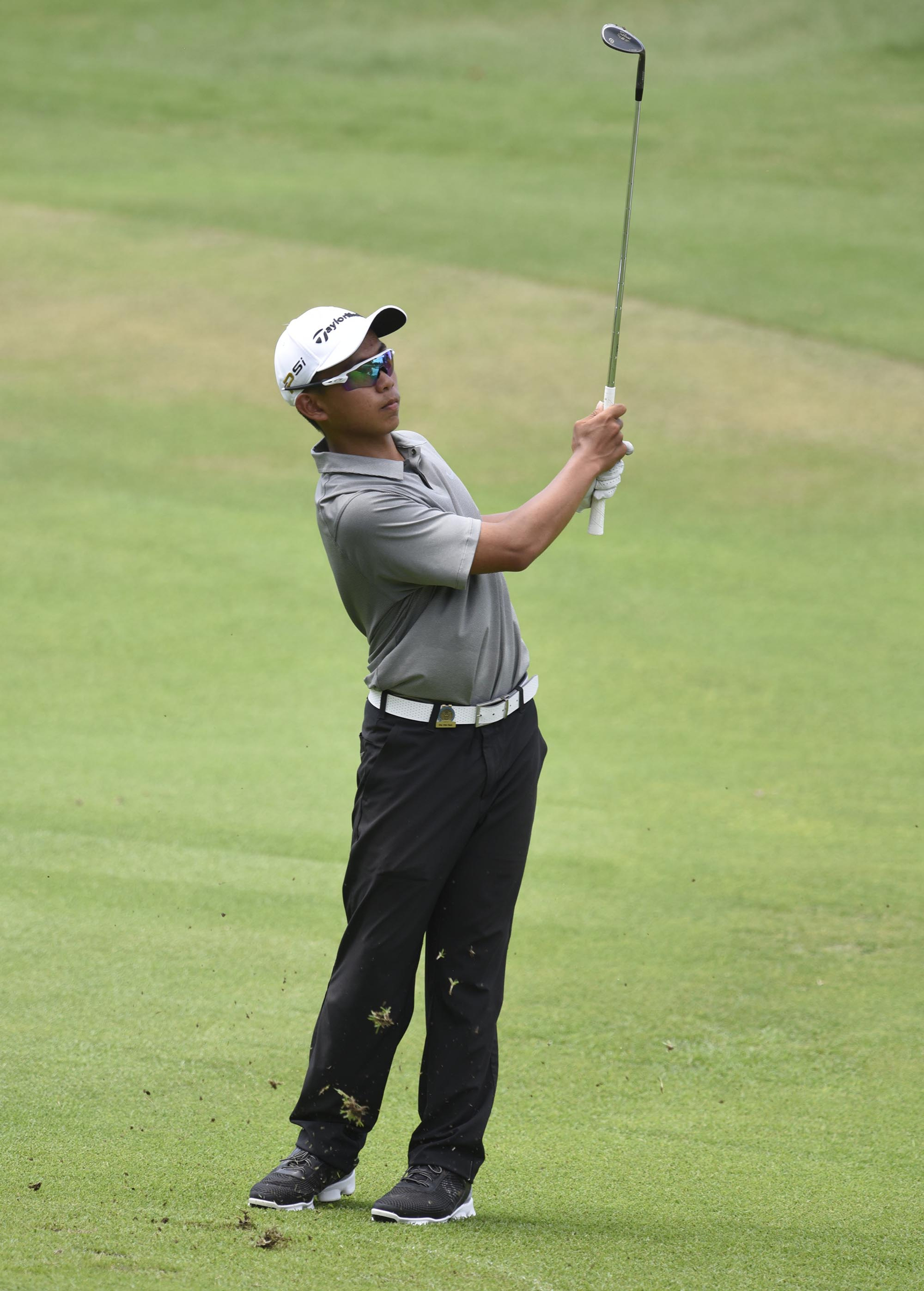 Wei Wei Gao of the Phillippines chips from the drop zone on the 9th hole. Gao defeated Brendan Hansen of Spring Lake, New Jersey 3 and 2. The third day of the 69th U.S. Junior Amateur Championship was held at the Honors Course in Ooltewah, Tennessee, Wednesday July 20, 2016.