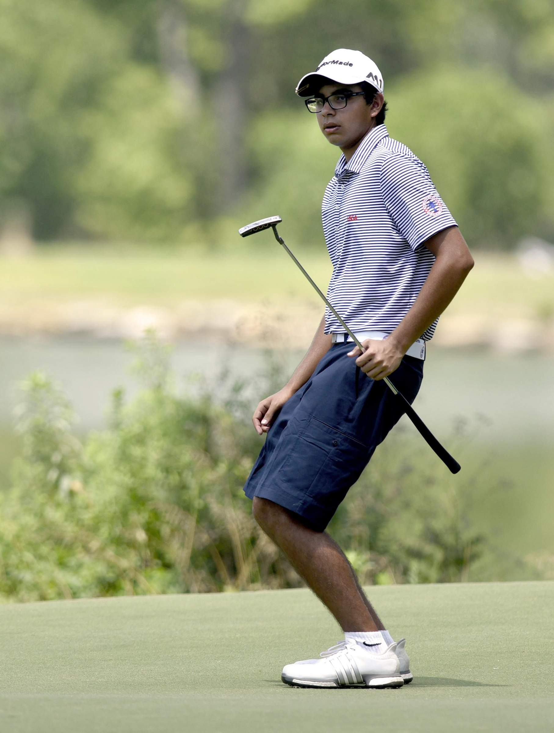 India's Arjun Puri reacts to missing a putt on the 9th hole. Puri defeated Cullan Brown of Paducah, Kentucky 3 and 2. The third day of the 69th U.S. Junior Amateur Championship was held at the Honors Course in Ooltewah, Tennessee, Wednesday July 20, 2016.